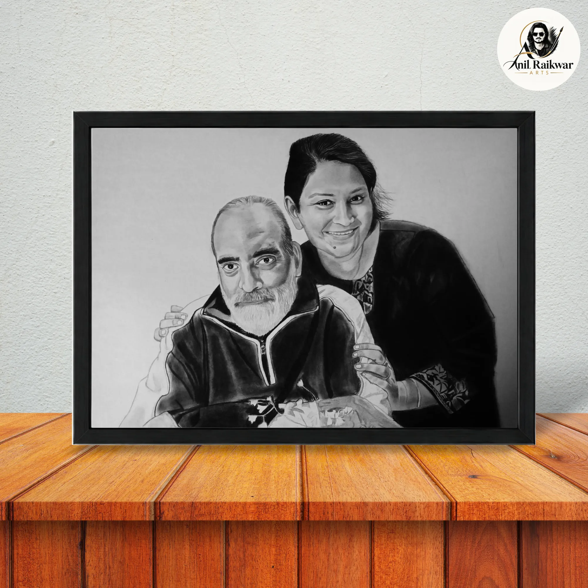 Framed black and white pencil sketch gift for parents showing a couple’s hand-drawn portrait